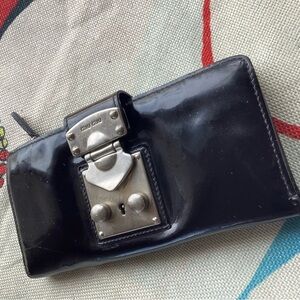 Miu Miu patent leather pocketbook made in Italy